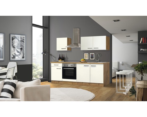 FLEX WELL Keukenblok met apparatuur Vintea magnolia mat 210x60 cm Lichte inbouwkeuken met elektrische apparaten in een moderne woonkamer.
