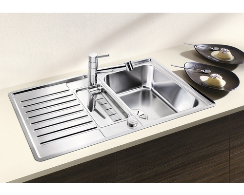 Spoelbak van roestvrij staal met afdruipvlak en kraan