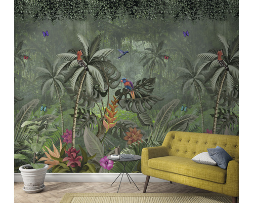 Woonkamer met een jungle fotobehang met bomen, vogels en vlinders