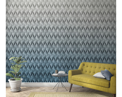 Decoratieve wand met driedimensionale panelen, gele bank en plant in pot