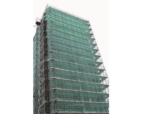 Gebouw met steiger en beschermend net