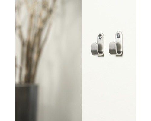 Twee metalen haken voor wandmontage