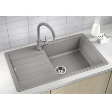 Grijze gootsteen met afdruiprek en kraan