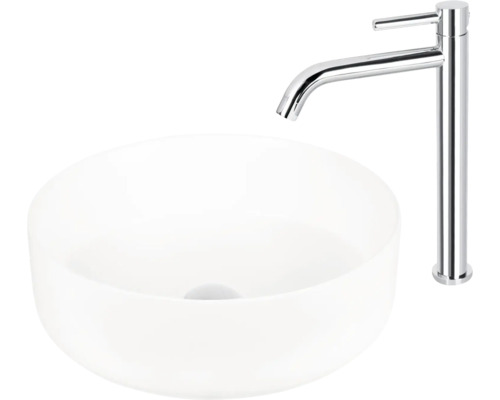 Opzetwastafel van keramiek met een kraan van metaal