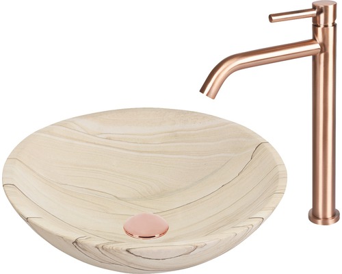 Wastafel van steen met kraan