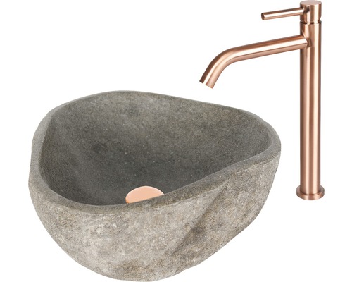 Wastafel van steen met kraan