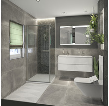 Badkamer met douche, wastafel, spiegel en toilet