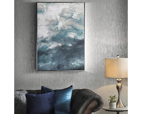 Ingelijste muurdecoratie met abstract patroon boven sofa