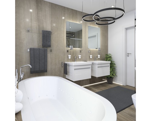 Badkamer met ligbad, twee wastafels met spiegels en handdoeken