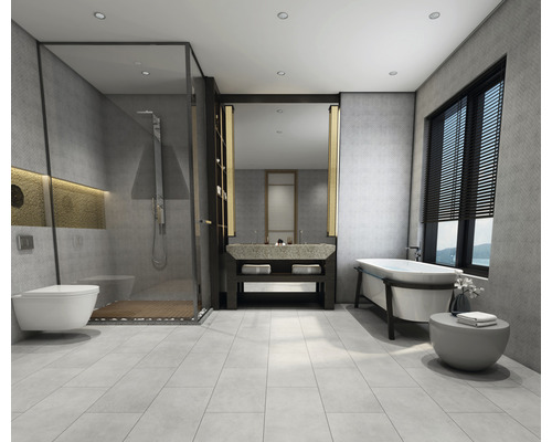 Lichte badkamer met douche, wastafel en ligbad.