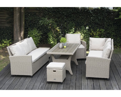 Tuinmeubelset met tafel, hoekbank, bank en kruk op een houten terras