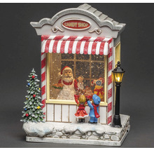 Kerstdecoratie met snoepwinkel, kerstman en kinderen