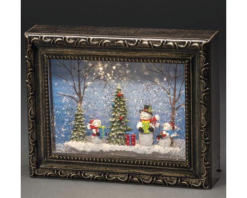 Decoratieve sneeuwbol met sneeuwmanmotief in fotolijstoptiek