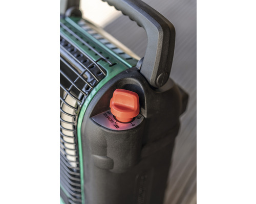 Close-up van een gaskachel met bedieningsknop