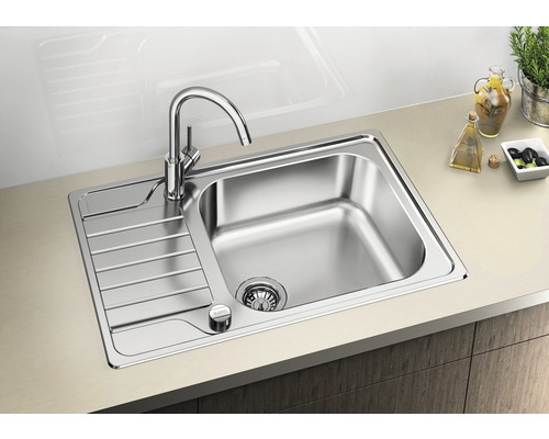 Roestvrijstalen spoelbak met afdruiprek en kraan