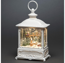 Decoratieve kerstlantaren met kerstman in slee en winterlandschap