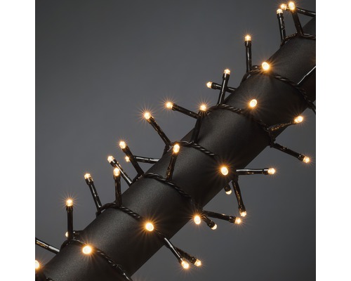 KONSTSMIDE Kerstverlichting LED cluster 600 lampjes extra warmwit 13,18 m Lichtsnoer met kleine, warmwitte lichtjes en zwarte kabel.
