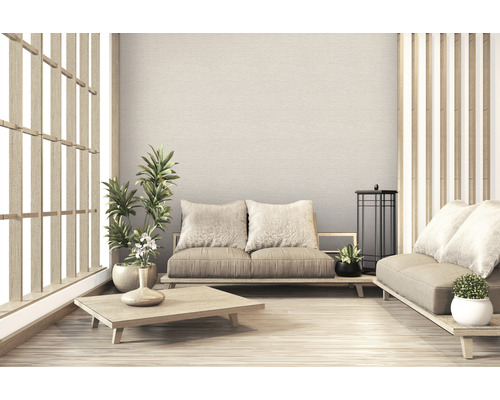 Licht interieur met houten meubels, planten en zithoek in Japanse stijl