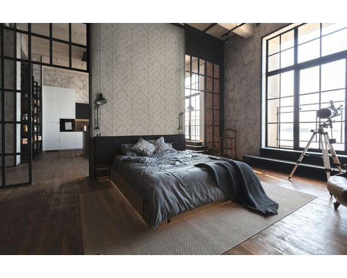 Slaapkamer met bed, geometrisch behang en groot raam