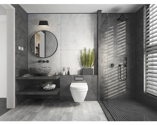 Moderne badkamer met toilet, wastafel, spiegel en douche