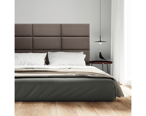 Moderne slaapkamer met bed, nachtkastje en lamp