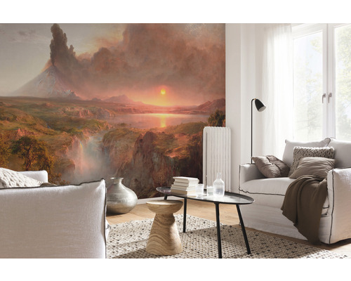 Woonkamer met landschapbehang, banken, vloerkleed en tafel