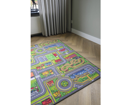 Speelkleed met straten en gebouwen in de kinderkamer