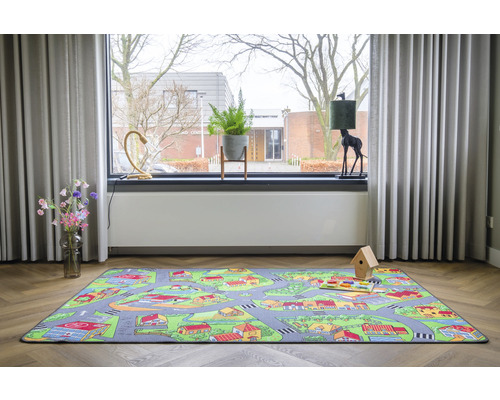 Speelkleed met stadsdesign in de woonkamer