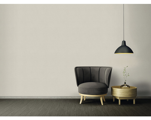 Interieurfoto met fauteuil, bijzettafel en hanglamp