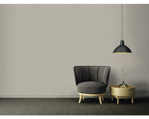 Kamerinrichting met fauteuil, bijzettafel en hanglamp