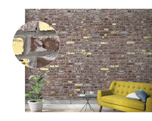 Woonkamer met een muur in baksteenlook als decoratie