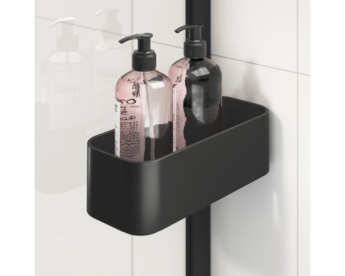 Zwarte doucheplank met twee zeepdispensers in de badkamer.