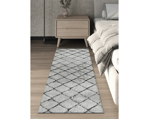 Tapijt met ruitpatroon in de slaapkamer