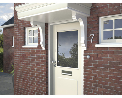 Entree van een huis met een luifel boven de voordeur