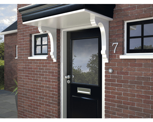 Entree van een huis met een afdak boven de voordeur