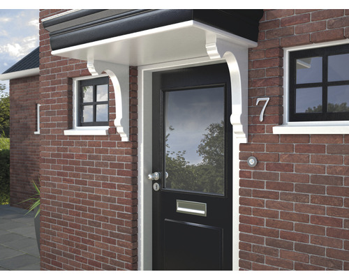 Vooraanzicht van een huis met luifel boven de voordeur