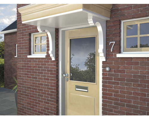 Vooraanzicht van een huis met een afdak en een voordeur