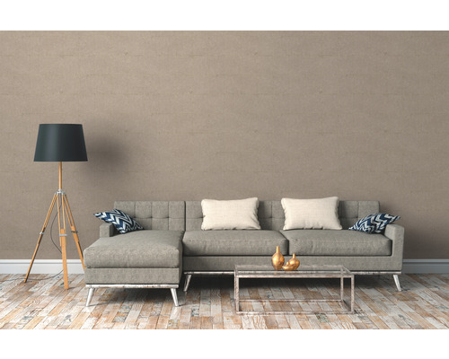 Woonkamer met grijze bank, staande lamp en salontafel