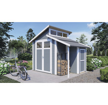 Tuinhuis met fietsen en houtrek in de tuin.