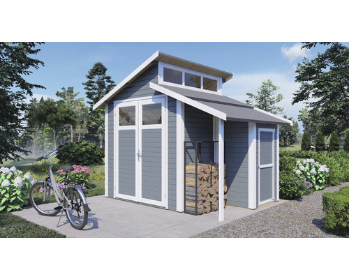 Tuinhuis met fietsen en houtrek in de tuin.