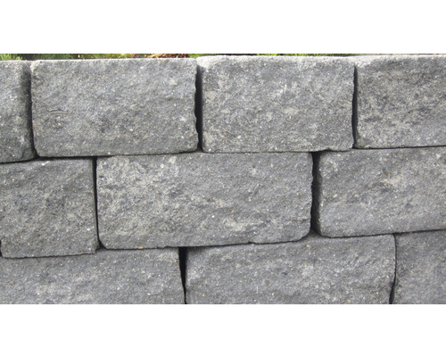 Muur van grijze betonstenen