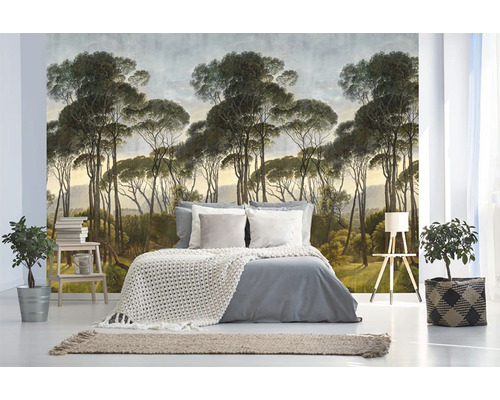 Slaapkamer met bosbehang, bed en kamerplanten