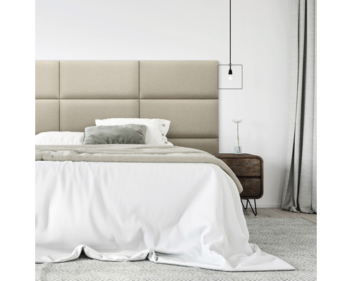 Slaapkamer met gestoffeerd hoofdeinde, bed en nachtkastje