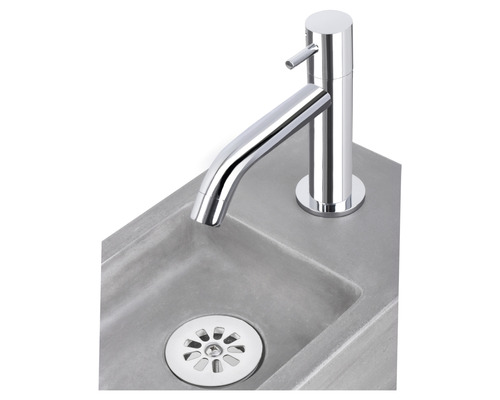 Afbeelding van een wastafel met afvoer en kraan