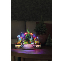 Decoratief dierentuin kerstlandschap met verlichting op een tafel