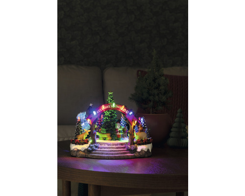 Decoratief dierentuin kerstlandschap met verlichting op een tafel