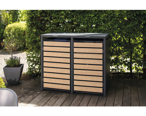 Dubbele afvalcontainerombouw met houten bekleding in de tuin