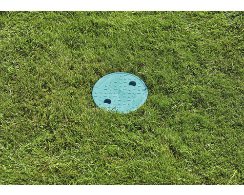 Ronde inspectieputdeksel in gazon