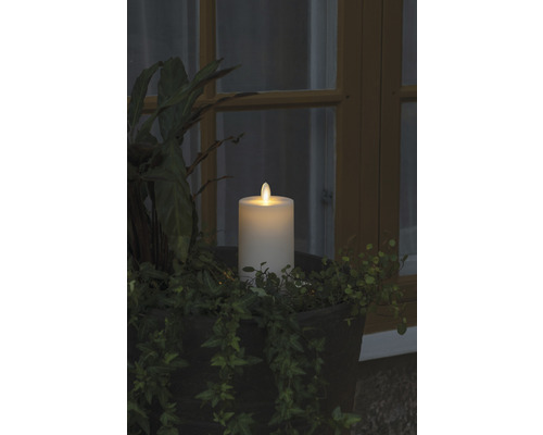 Decoratieve LED-kaars met planten in een plantenbak