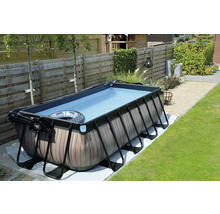 Rechthoekig frame zwembad in tuin met trap